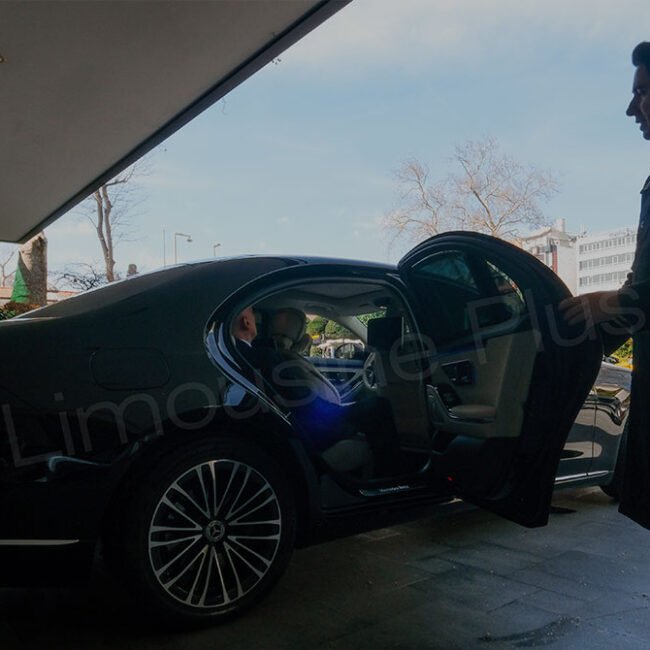 Chauffeur Opening Luxury Car Door
