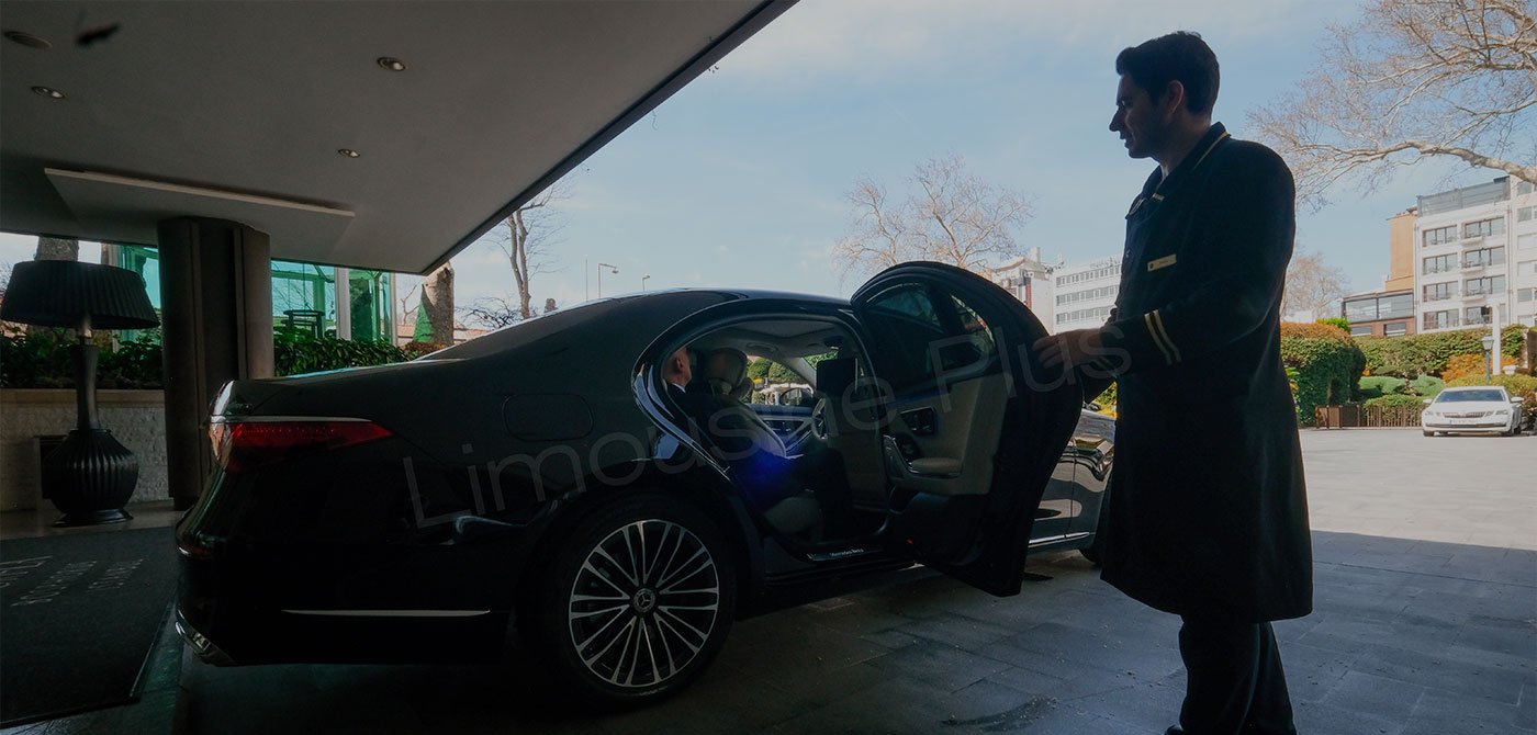 VIP Minibus Rental: Combination of Comfort and Prestige 1 Chauffeur Opening Luxury Car Door