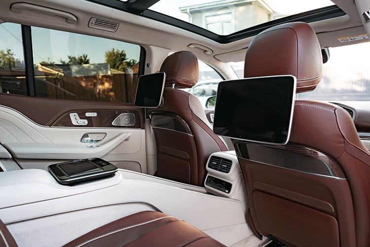 Chauffeured Car Rental in Istanbul 1 The luxurious interior of a Mercedes-Benz with rear-seat entertainment screens, showcasing the premium features of our Istanbul chauffeured car rental service.